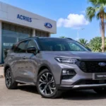 Ford Territory 2026 à Djibouti gris cactus garé devant le showroom Acries avec jantes alliage 19 pouces et phares LED